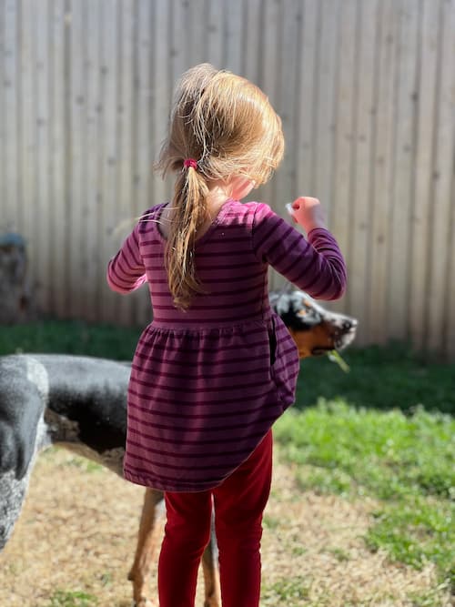 Image of a girl and a dog
